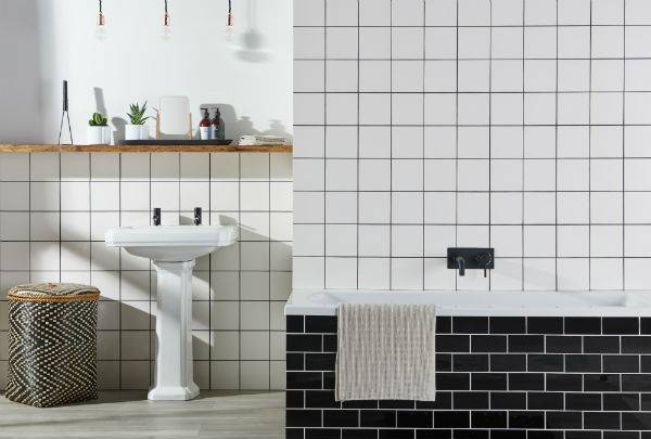 white bathroom tiles with black grout